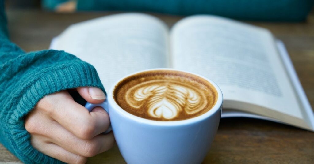 Coffee and book green sweater