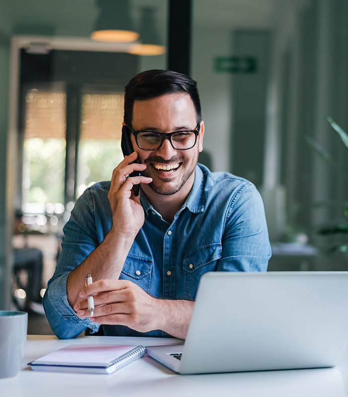 Happy man on phone call