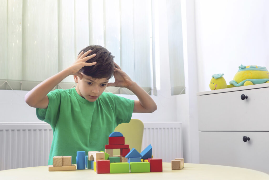 young boy having a meltdown in February.